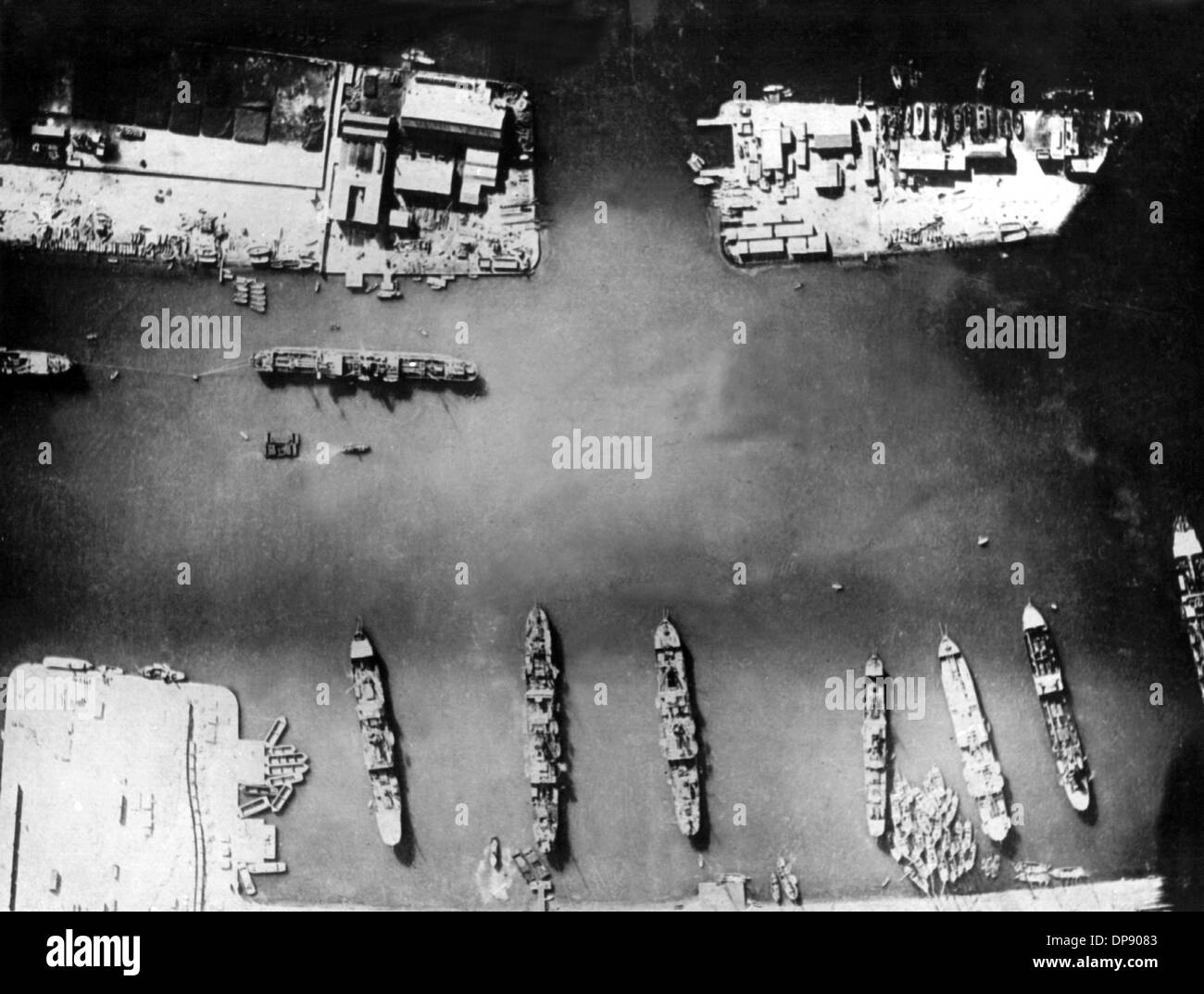 Aerial photograph of the port facilities of PortSaid at the Suez Canal during World War I. Set off by the deadly shots on Austrian heir to the throne Franz Ferdinand by Serbian nationalists on the 28th of June in 1914 in Sarajevo, World War I broke out. During World War I, Germany, Austria, Austria-Hungary as well as later Turkey and Bulgary fought against Britain, France and Russia. The sad end result in 1918 comprised roughly 8.5 million soldiers killed in action, more than 21 million wounded and almost 8 million prisoners of war and missing people. Stock Photo