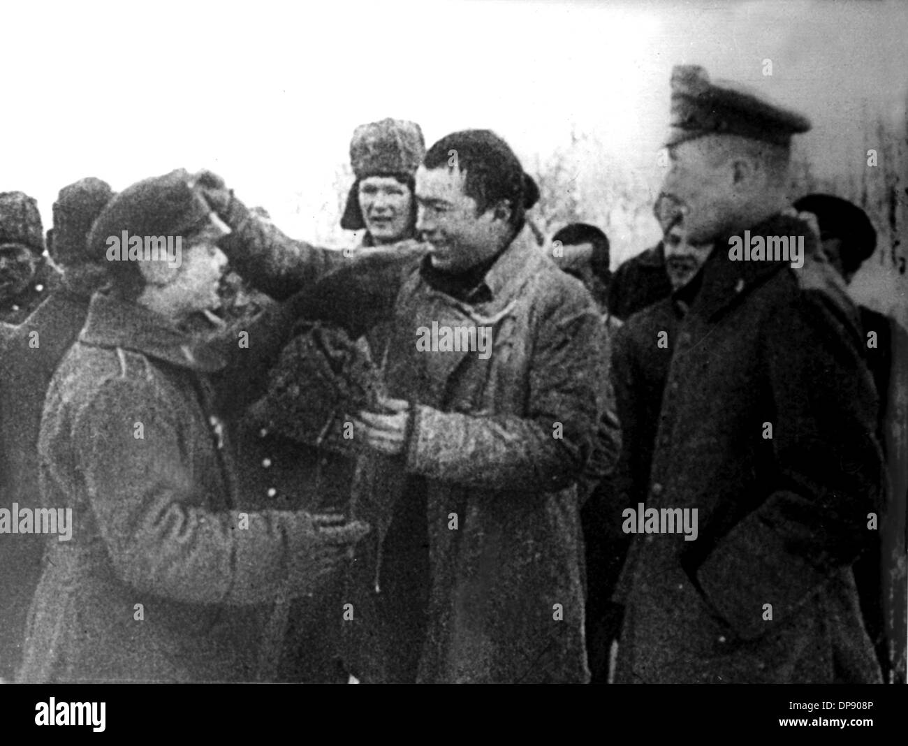 Fraternization of German and Russian soldiers at the Eastern Front after the breakout of the Russian Revolution in November 1917. Set off by the deadly shots on Austrian heir to the throne Franz Ferdinand by Serbian nationalists on the 28th of June in 1914 in Sarajevo, World War I broke out. During World War I, Germany, Austria, Austria-Hungary as well as later Turkey and Bulgary fought against Britain, France and Russia. The sad end result in 1918 comprised roughly 8.5 million soldiers killed in action, more than 21 million wounded and almost 8 million prisoners of war and missing people. Stock Photo