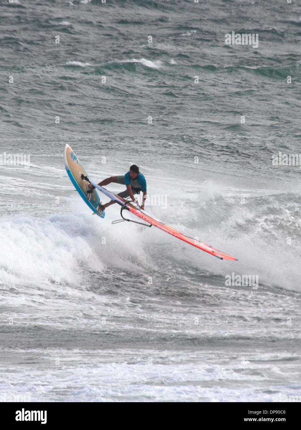 World champion windsurfer Philip Koster, performing an aerial manoeuvre. Stock Photo