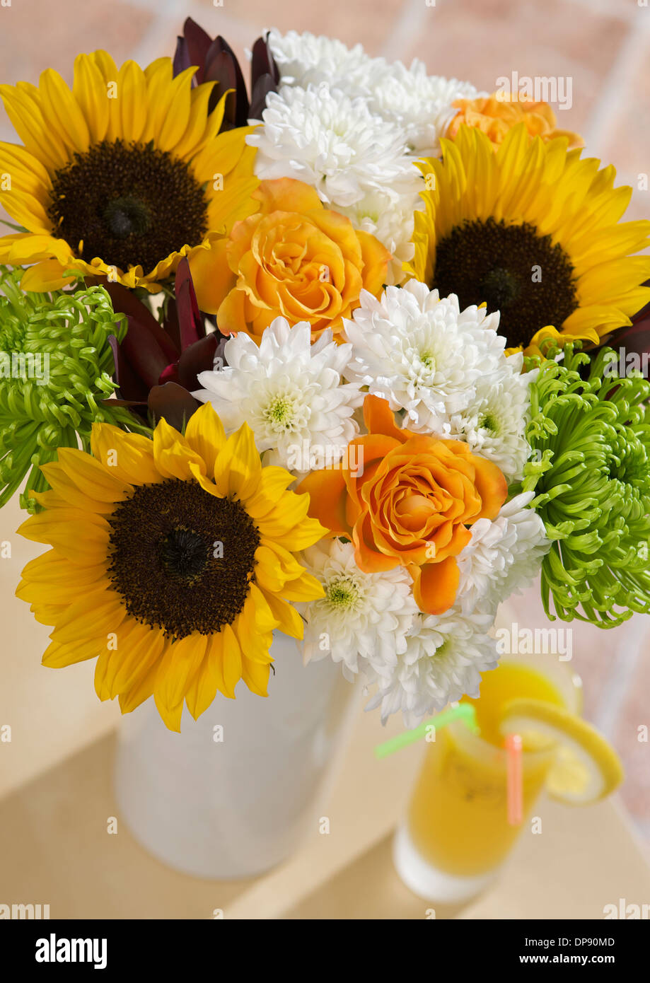 sunflowers, orange Marie Claire Roses, lime green Anastasia, white