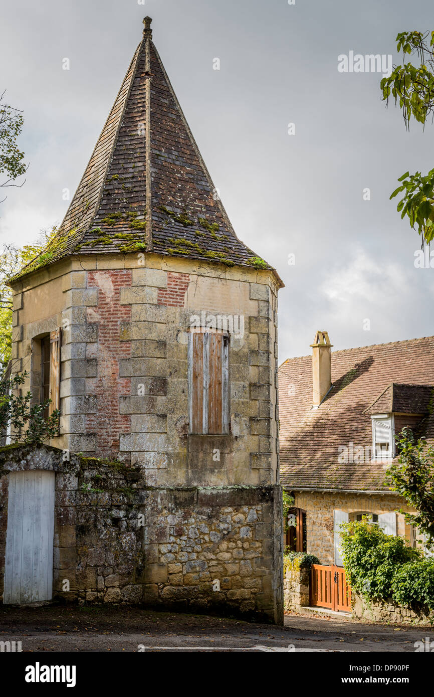 Old stone tower in streets of Domme, France, Europe. Stock Photo