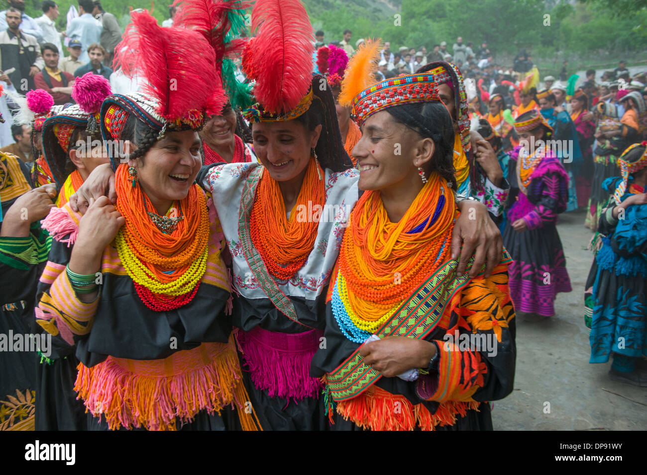 Kalash women dancing in a line at the Anish Brun Village Charso ...