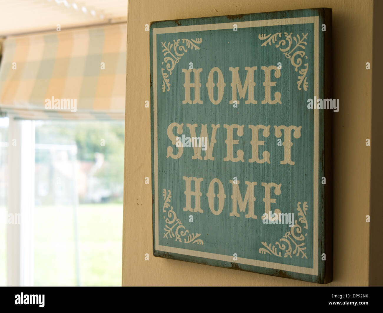 Home Sweet Home sign in a house kitchen Stock Photo