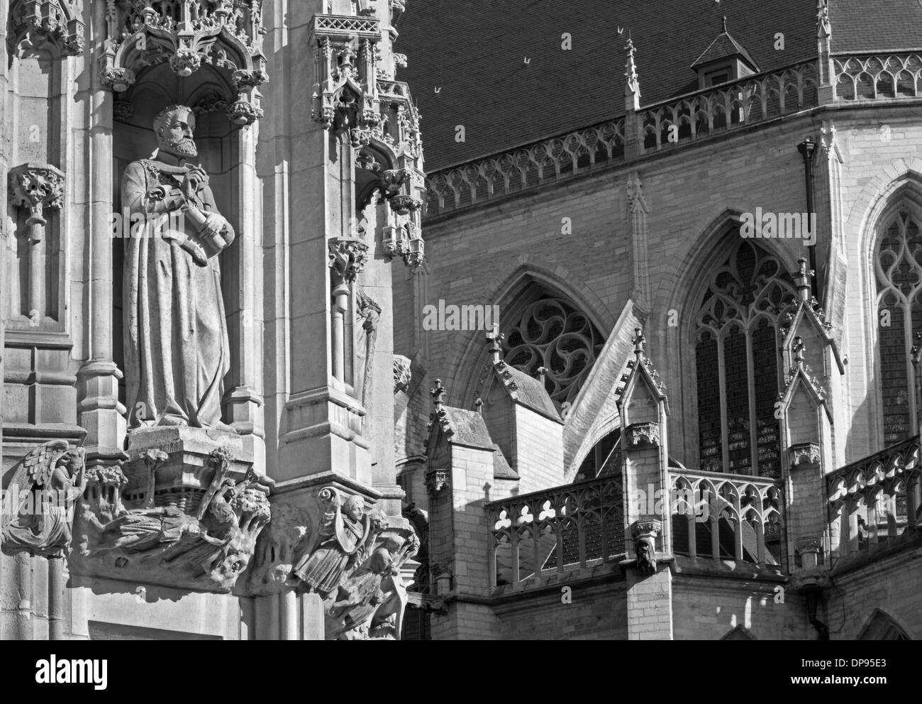 Leuven - Detail of gothic town hall and st. Peters cathedral in morning light Stock Photo