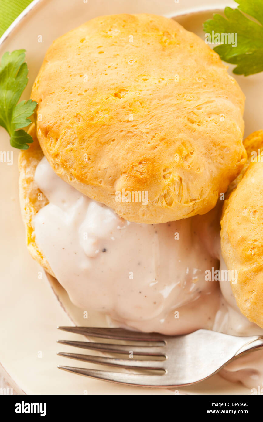 Homemade Buttermilk Biscuits and Gravy for Breakfast Stock Photo Alamy