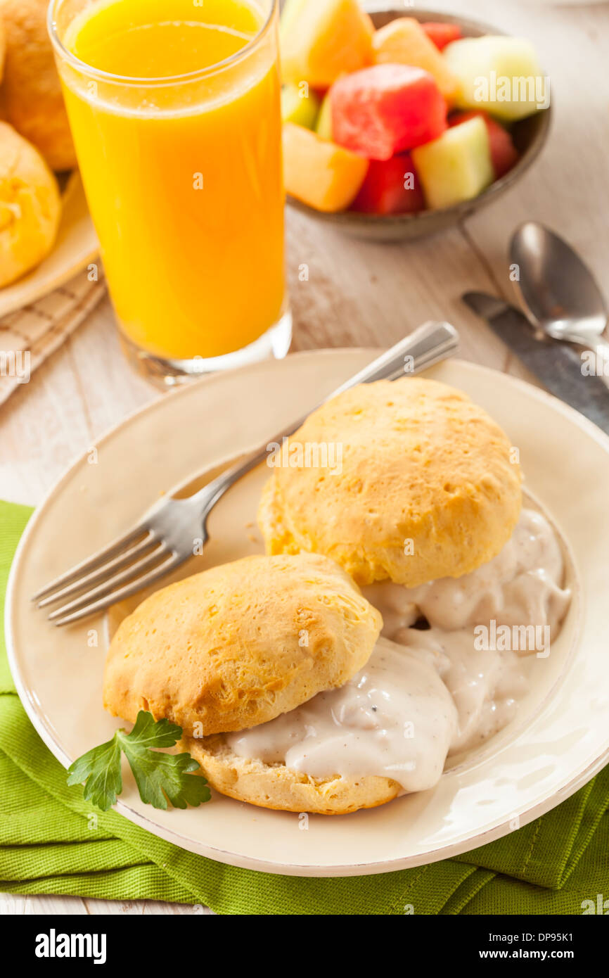 Homemade Buttermilk Biscuits and Gravy for Breakfast Stock Photo Alamy