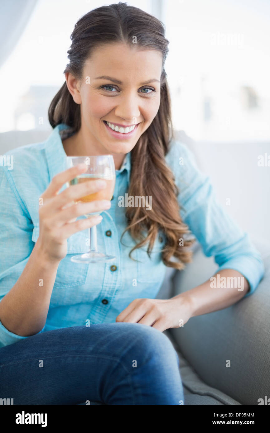Woman holding glass of wine hi-res stock photography and images - Alamy