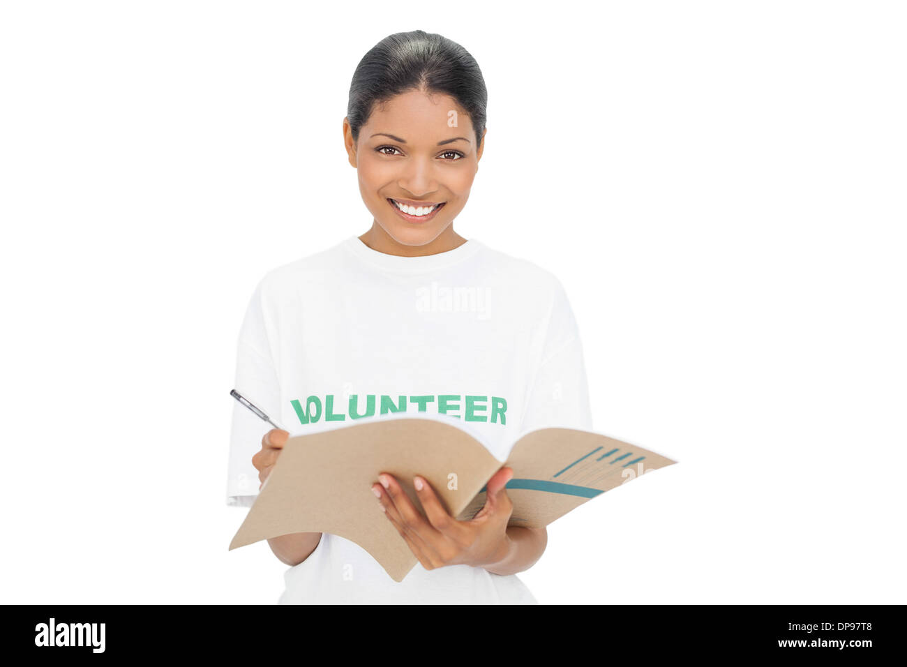 Smiling model wearing volunteer tshirt writing Stock Photo