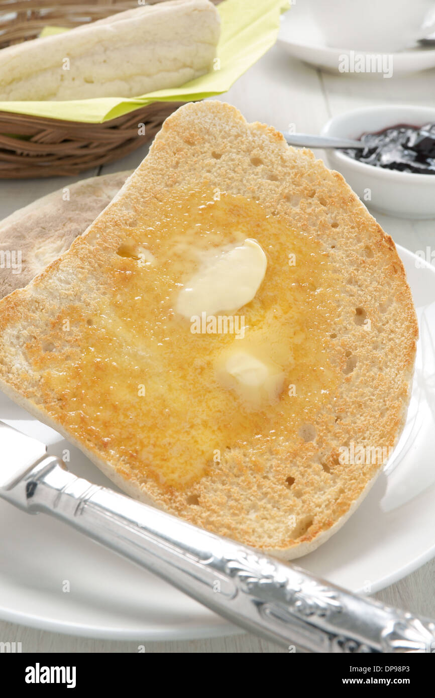Irish Soda Bread or Farls split toasted and buttered Stock Photo
