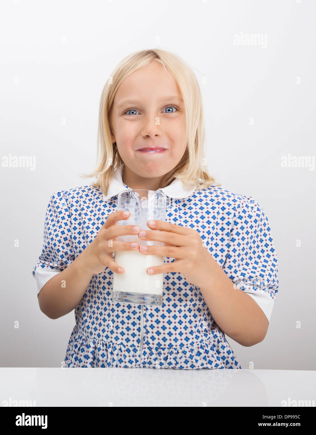 Portrait of girl drinking milk Stock Photo Alamy