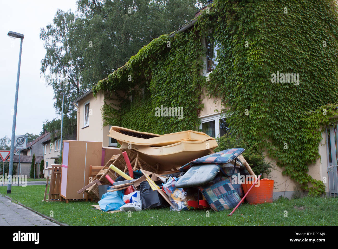 Rubbish piled up in front of house awaiting collection Stock Photo