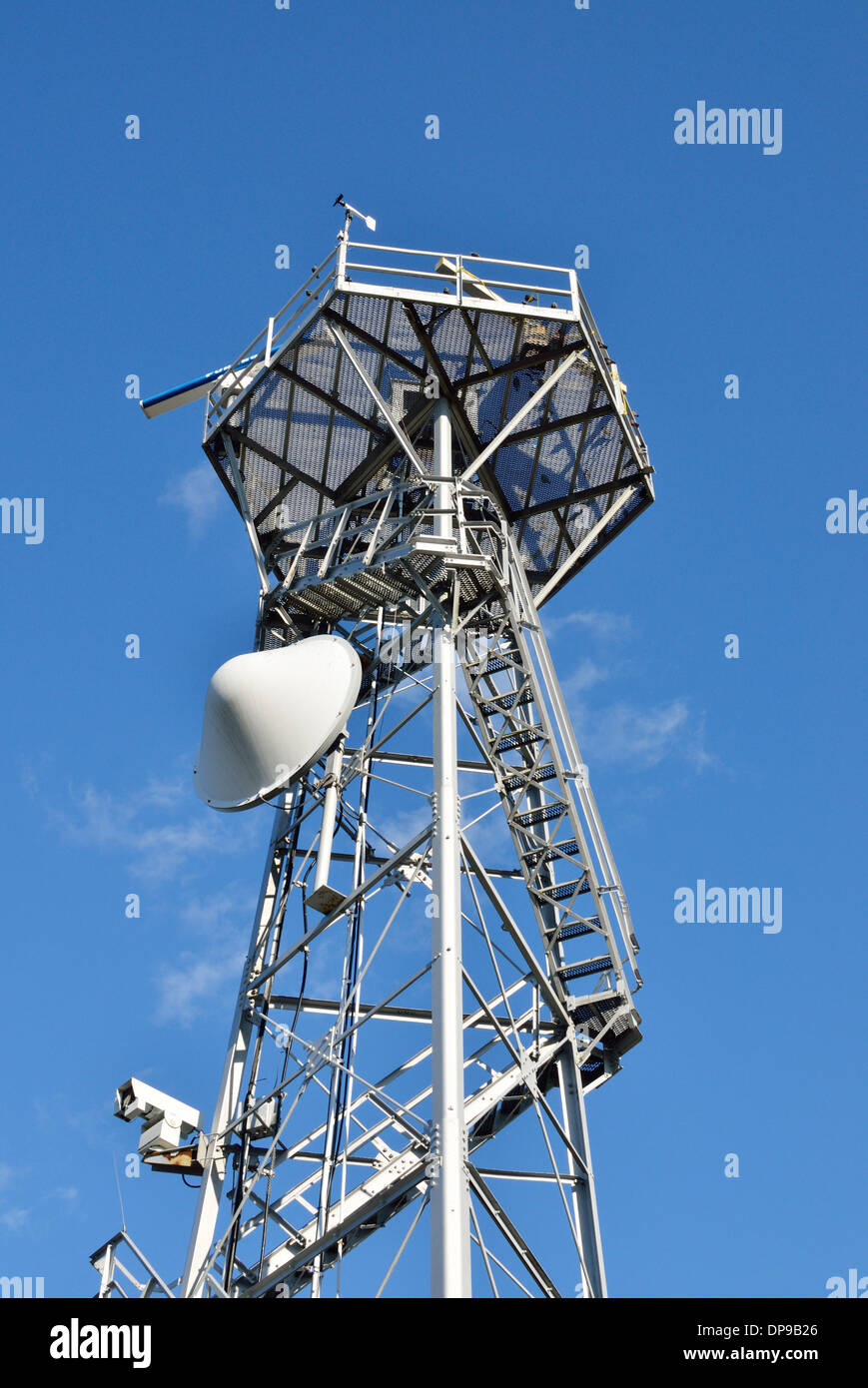 Radar Tower with electronic navigation on clear blue sky day. USA Stock