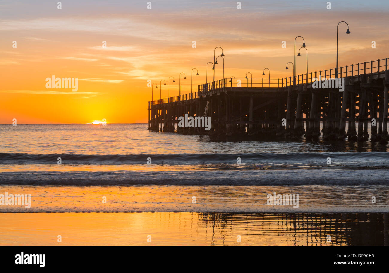 Sunrise over the beach and pier at Coffs Harbour, New South Wales, Australia Stock Photo
