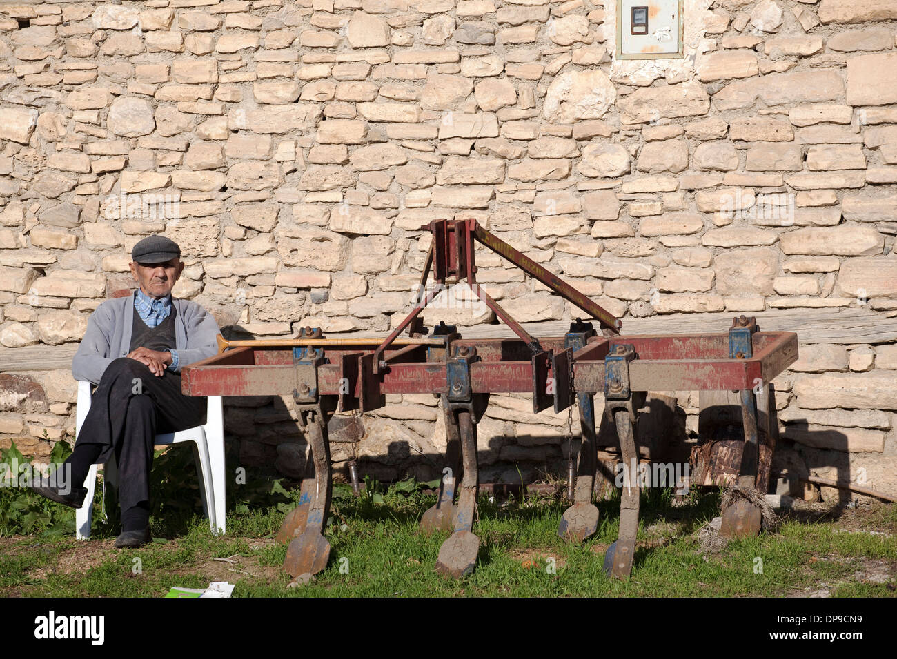 Framer sitting next to his plow Beyşehir Konya Turkey Stock Photo