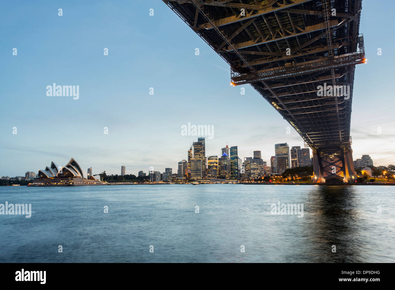 Under the Sydney Harbour Bridge at sunset, Sydney, Australia Stock Photo