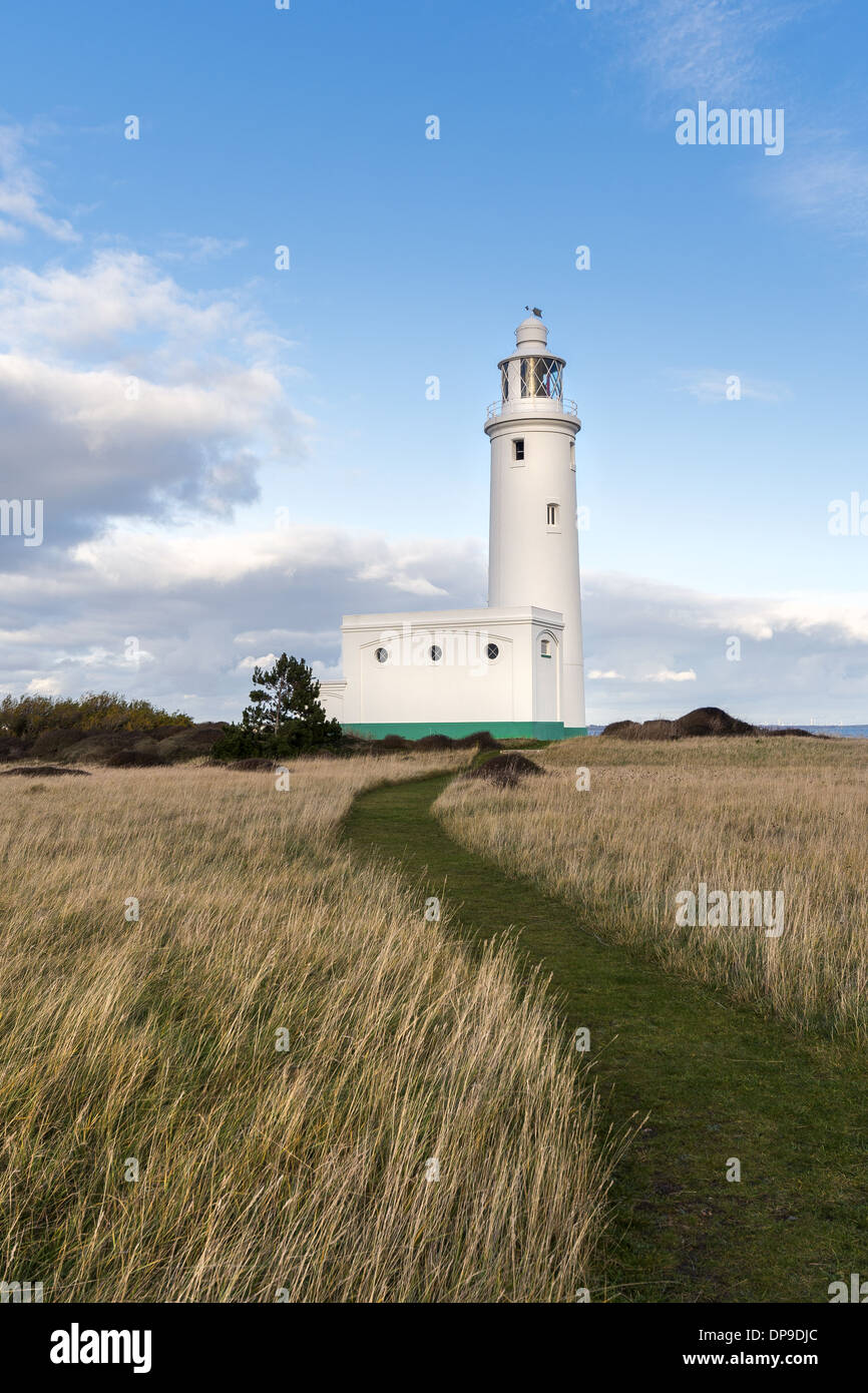 Hurst Point lighthouse located at the end of the long shingle spit next to Hurst Castle near Milford-on-Sea, England, UK Stock Photo