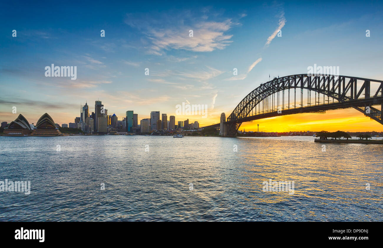 Sydney and Sydney Harbour Bridge at sunset, Australia Stock Photo