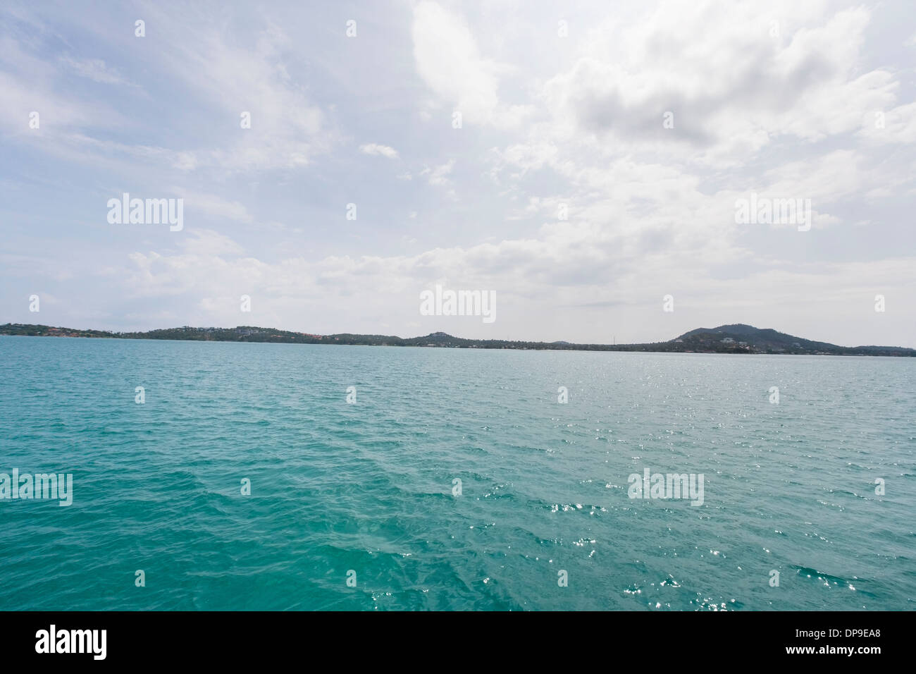 Tropical blue sea with island in background  Koh Samui  Thailand Stock Photo
