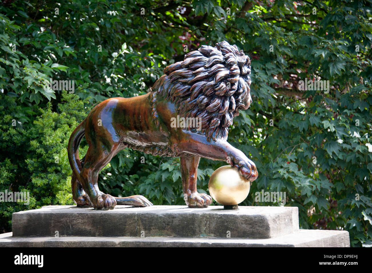 Bronze lion paw on globe hires stock photography and images Alamy