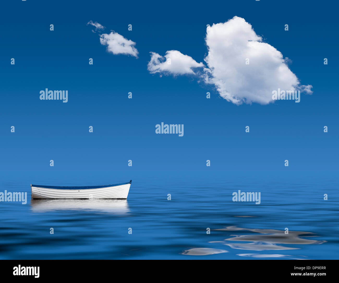 Boat alone on the ocean - peace, tranquillity, loneliness concept image Stock Photo