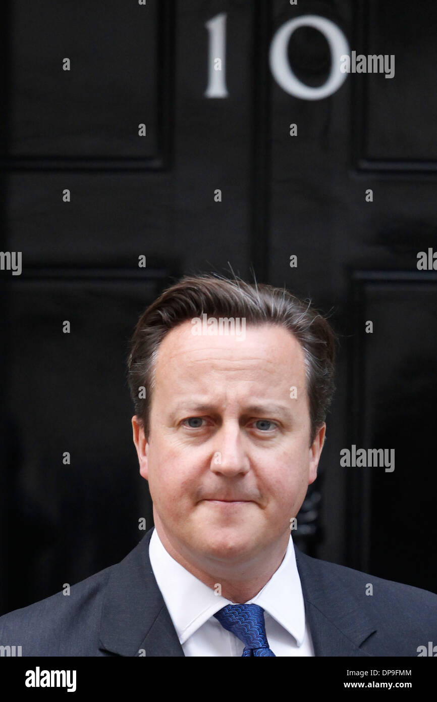 ritish Prime Minister David Cameron leaves No.10 Downing Street to greet Herman Van Rompuy President of the European Council in Stock Photo