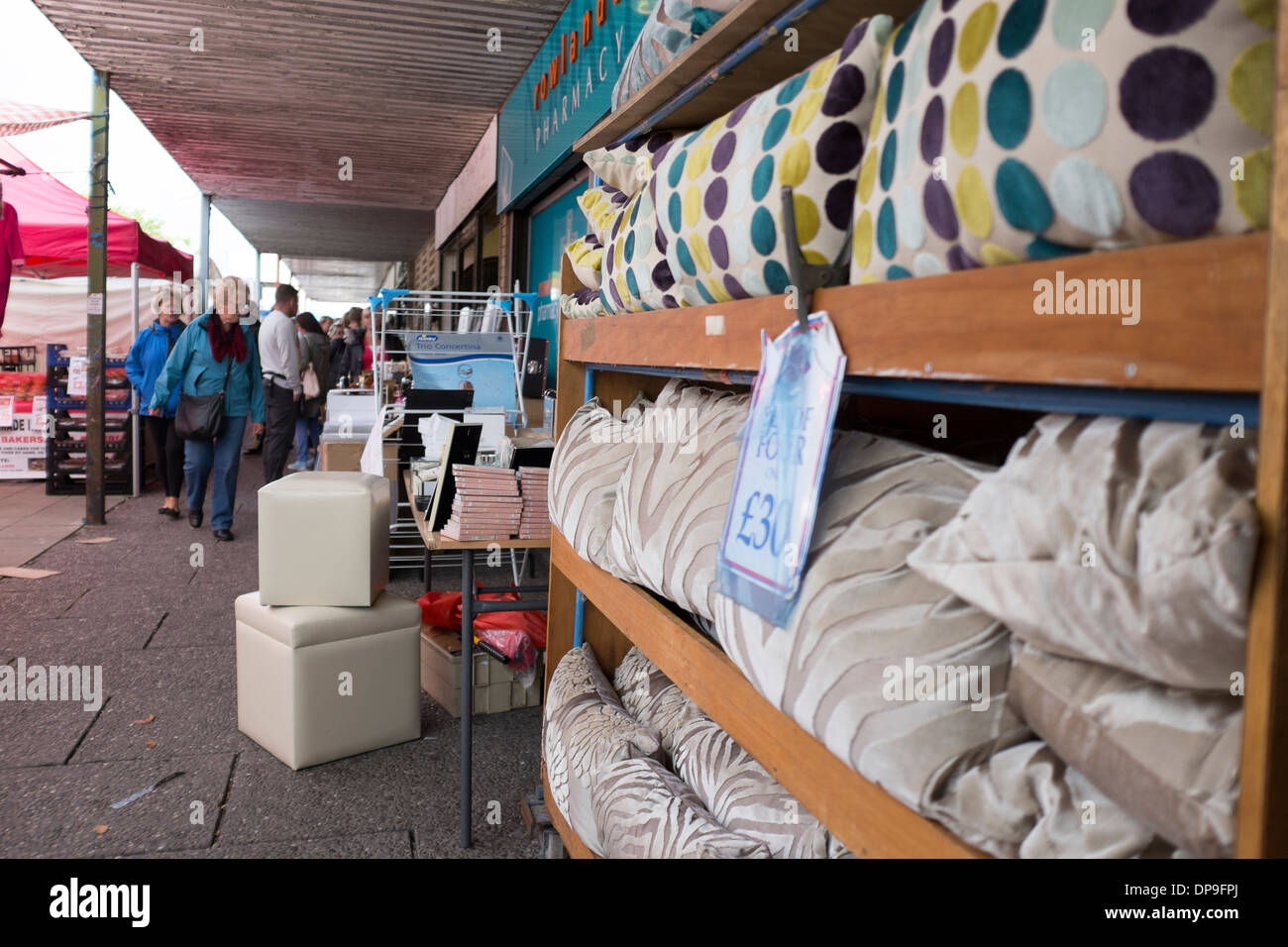Market stall selling cushions soft furnishings Stock Photo