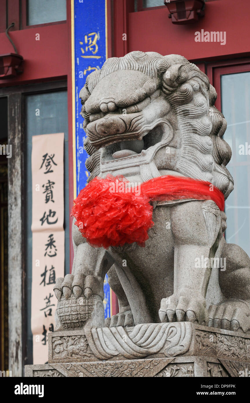 Lion statue in buddhist Qibao Temple near Qibao Ancient Town in Minhang District, Shanghai, China Stock Photo