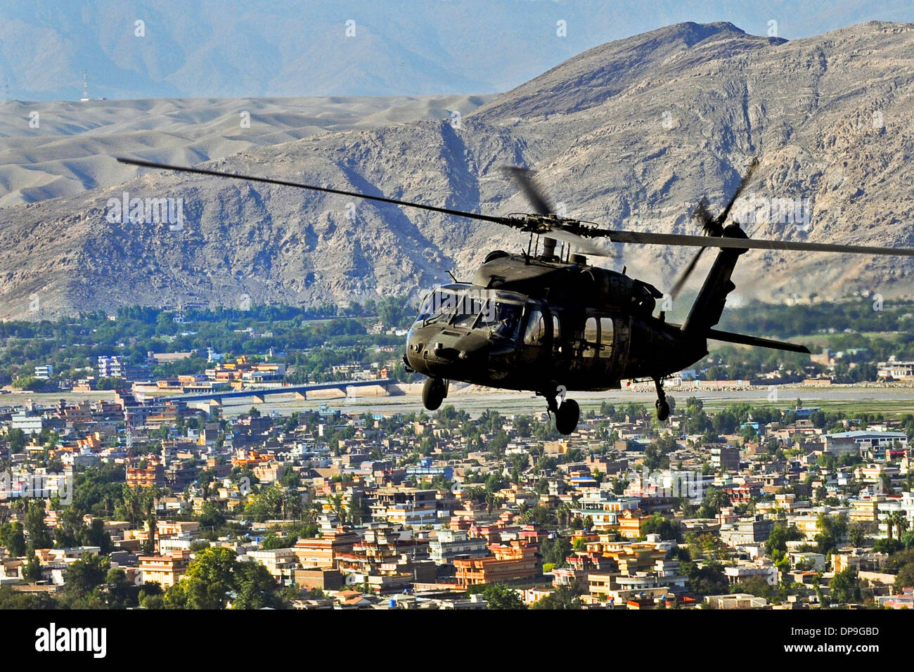 Black Hawk helicopter, U.S. Army UH-60L Black Hawk helicopter flies over the Nangarhar Province of Afghanistan Stock Photo