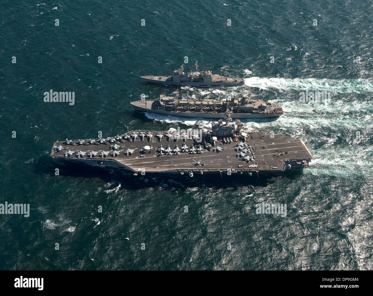Aircraft carrier USS Carl Vinson, guided missile cruiser USS Bunker Hill and support ship USNS Bridge Stock Photo