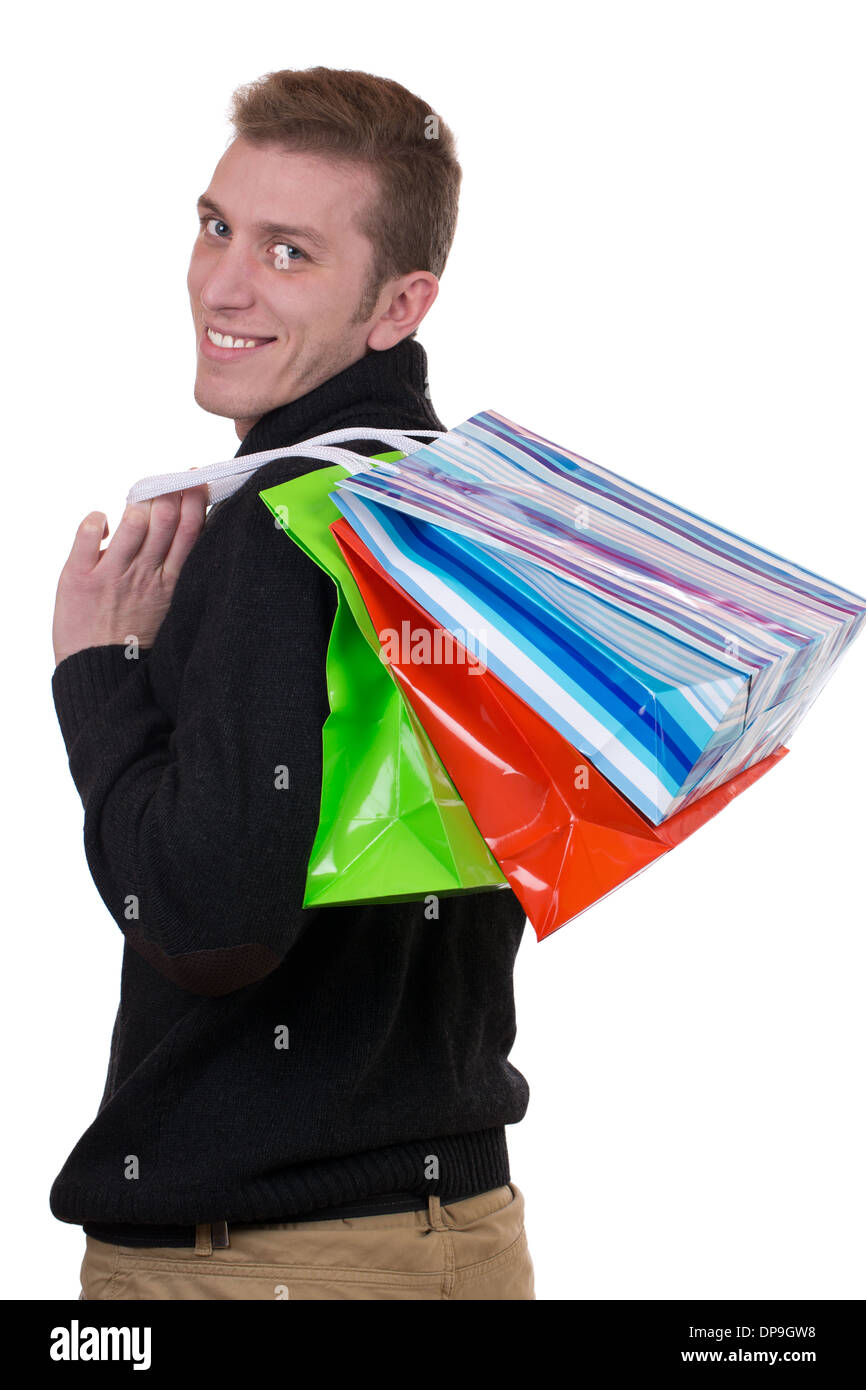 Young man with shopping bags, isolated on a white background Stock Photo