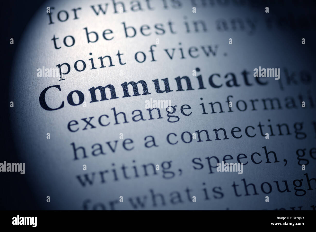 Fake Dictionary, Dictionary definition of the word communicate. Stock Photo