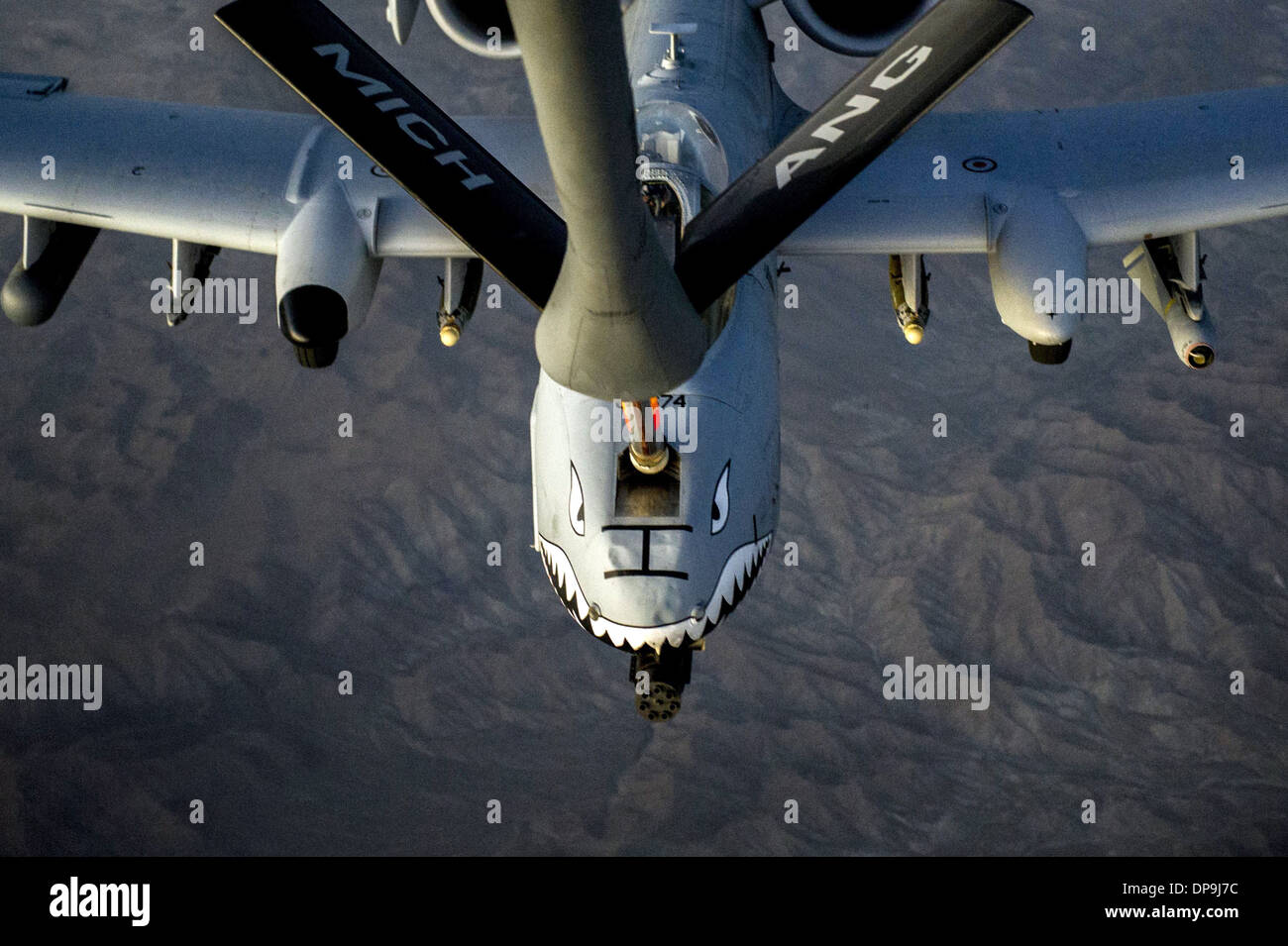 U.S. Air Force A-10C Thunderbolt II receives fuel from a KC-135 Stratotanker during an in-flight refueling over Afghanistan Stock Photo