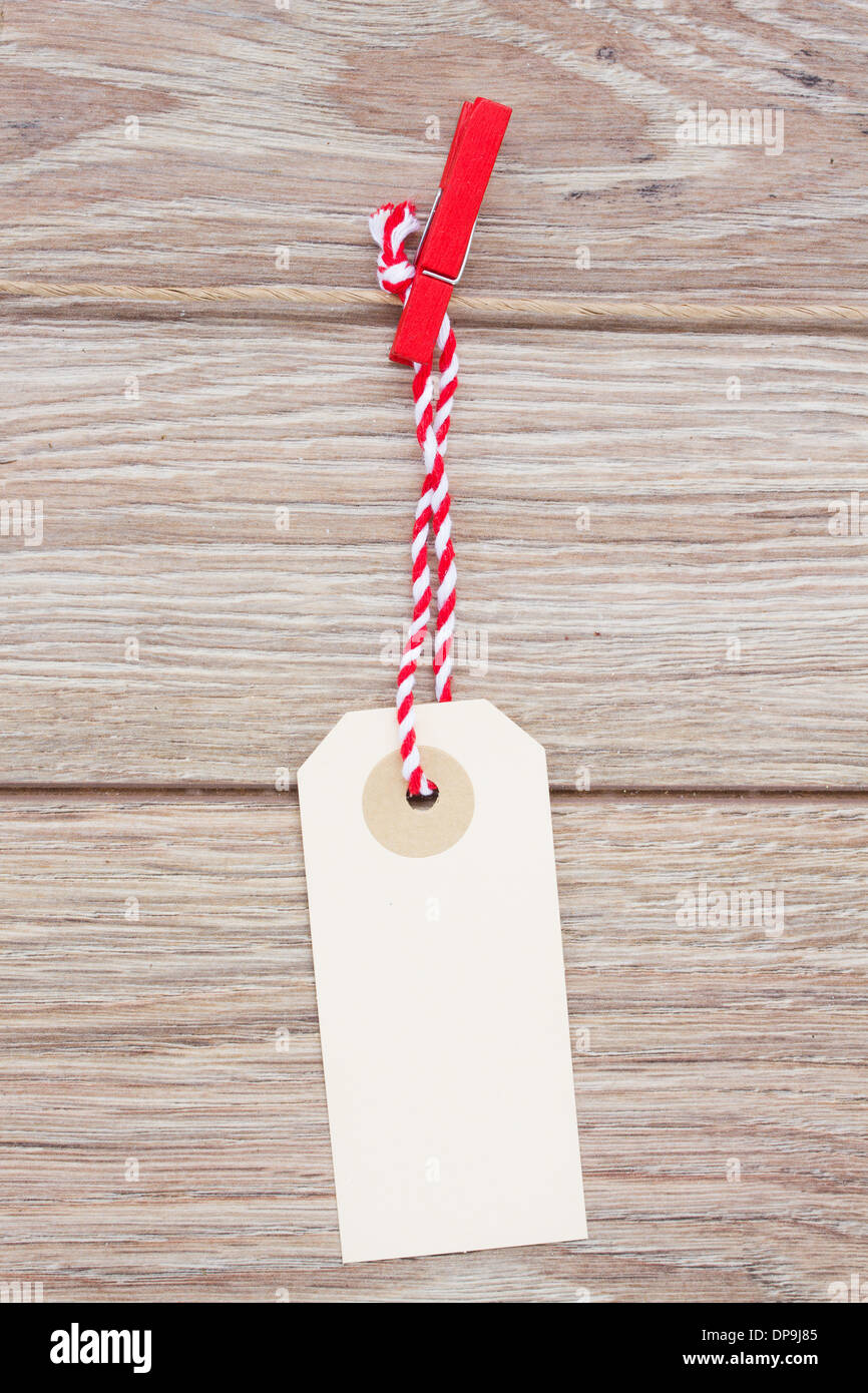one tag hanging on rope Stock Photo - Alamy