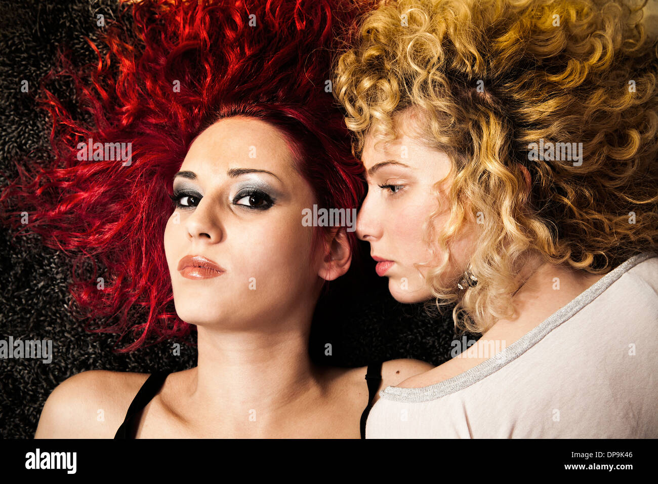 blond and red haired girls portrait Stock Photo