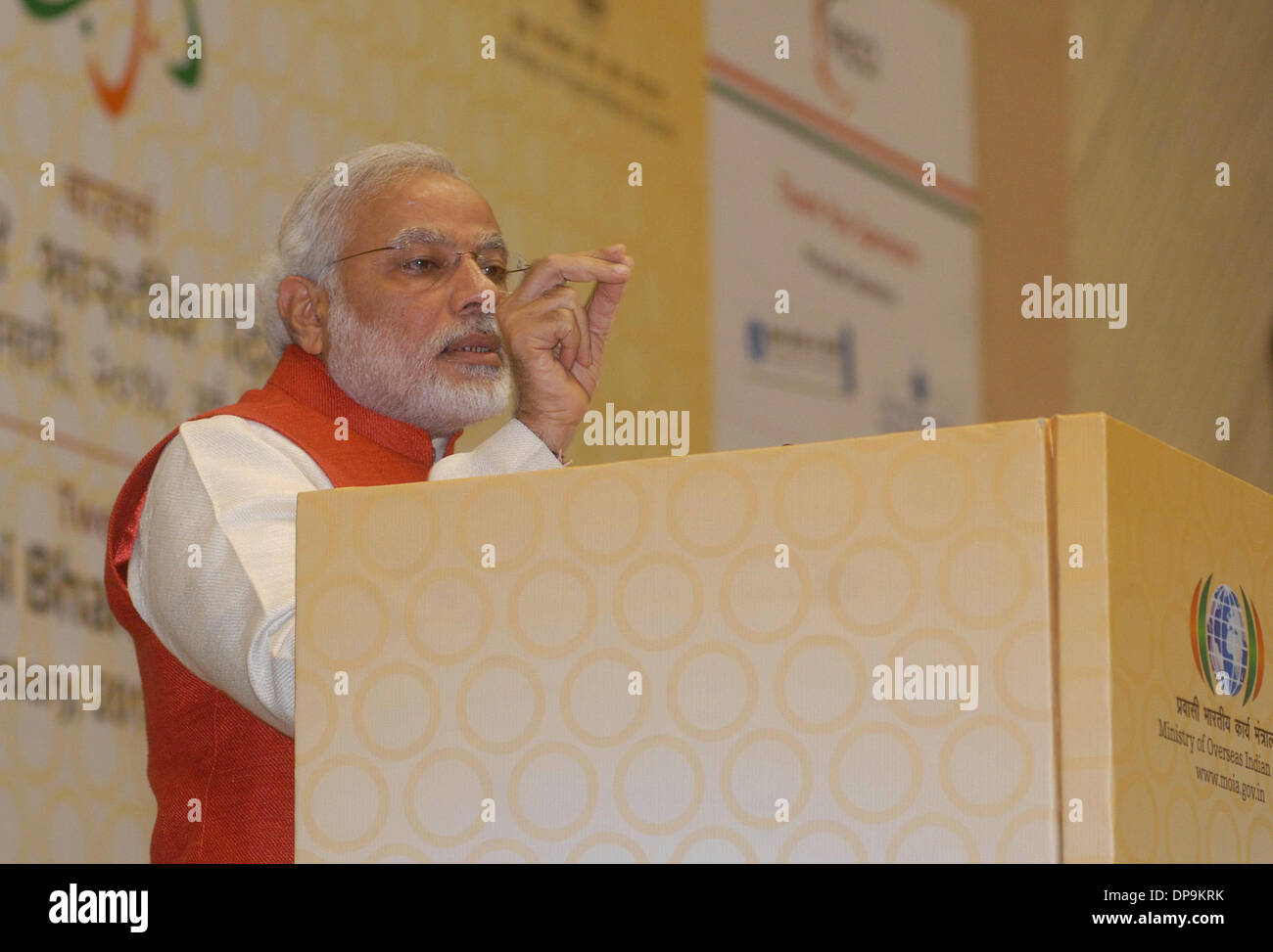 New Delhi, India. 10th Jan, 2014. Narendra Modi, India's main opposition Bharatiya Janata Party's prime ministerial candidate for the 2014 general elections, addresses the Pravasi Bharatiya Divas, the world's largest gathering of Indian diaspora in the national capital, at Vigyan Bhavan in New Delhi, India, Jan. 9, 2014. Narendra Modi, Thursday snubbed Prime Minister Manmohan Singh by saying he agreed with the country's leader that good times would come, but after the next general elections. © Partha Sarkar/Xinhua/Alamy Live News Stock Photo