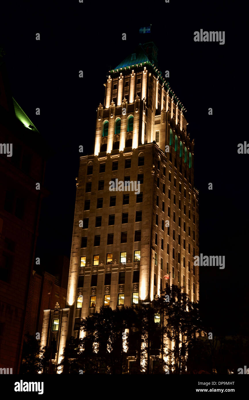 Price Building by night in Quebec City, Canada. Stock Photo