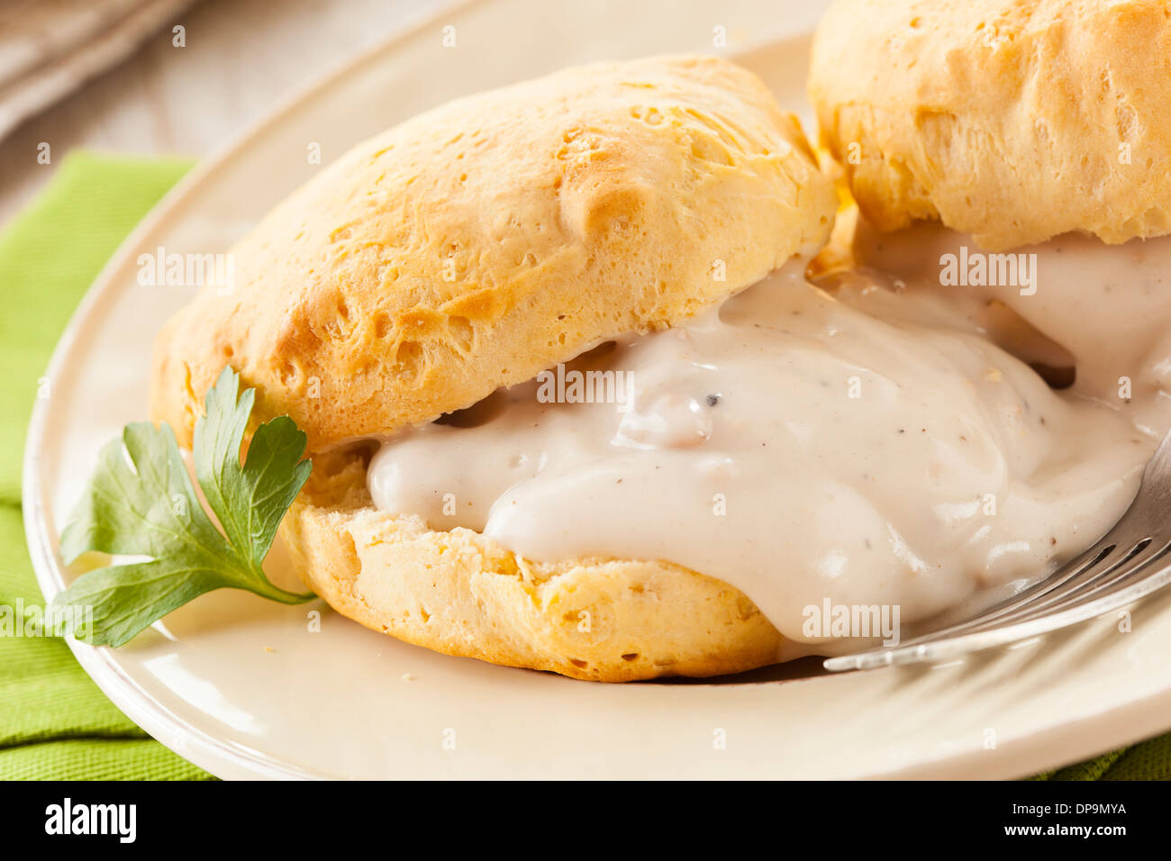 Homemade Buttermilk Biscuits and Gravy for Breakfast Stock Photo Alamy