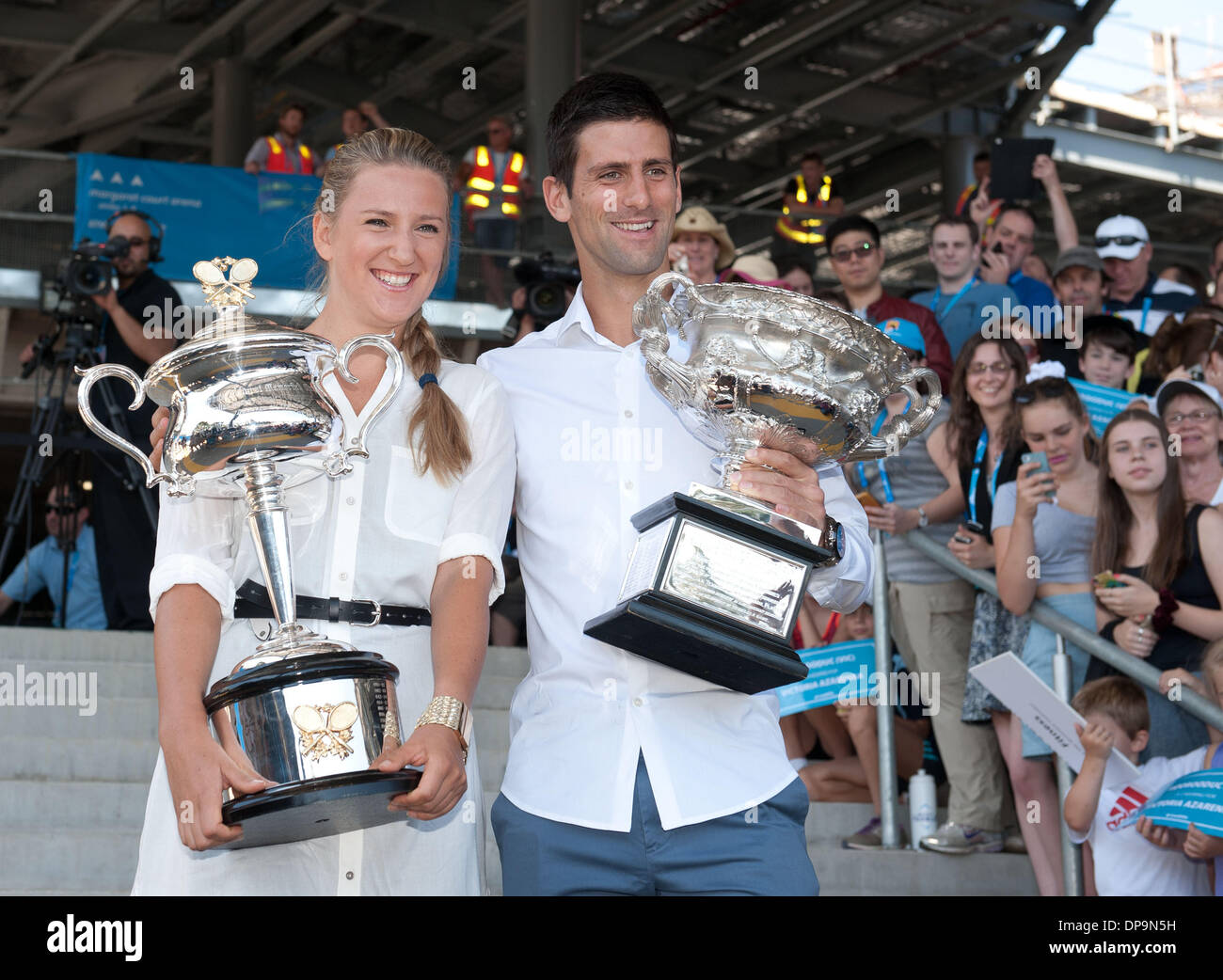 Melbourne, Australia. 10th Jan, 2014. Defending champions Victoria Azarenka (L) of and Novak Djokovic of Serbia pose with trophies prior to the official of the Australian Open tennis championship