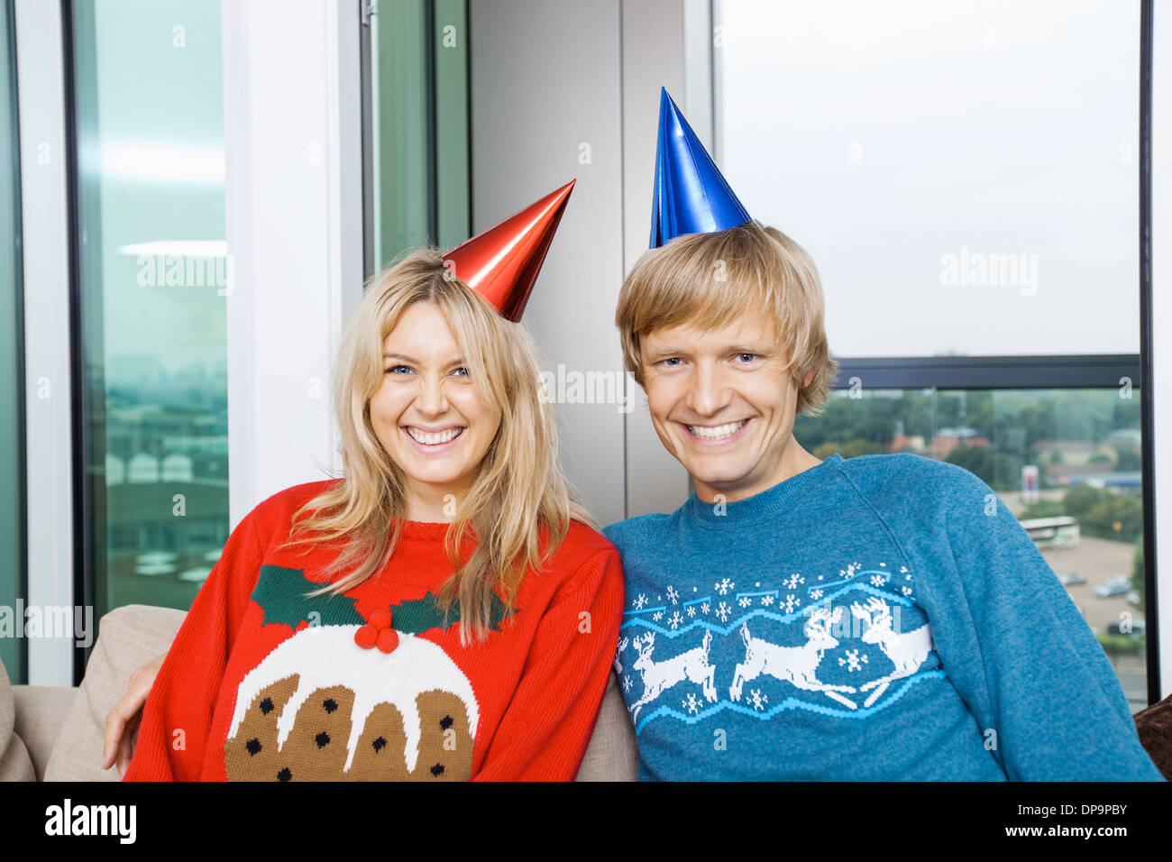 Young women wearing party hats hi-res stock photography and images - Alamy