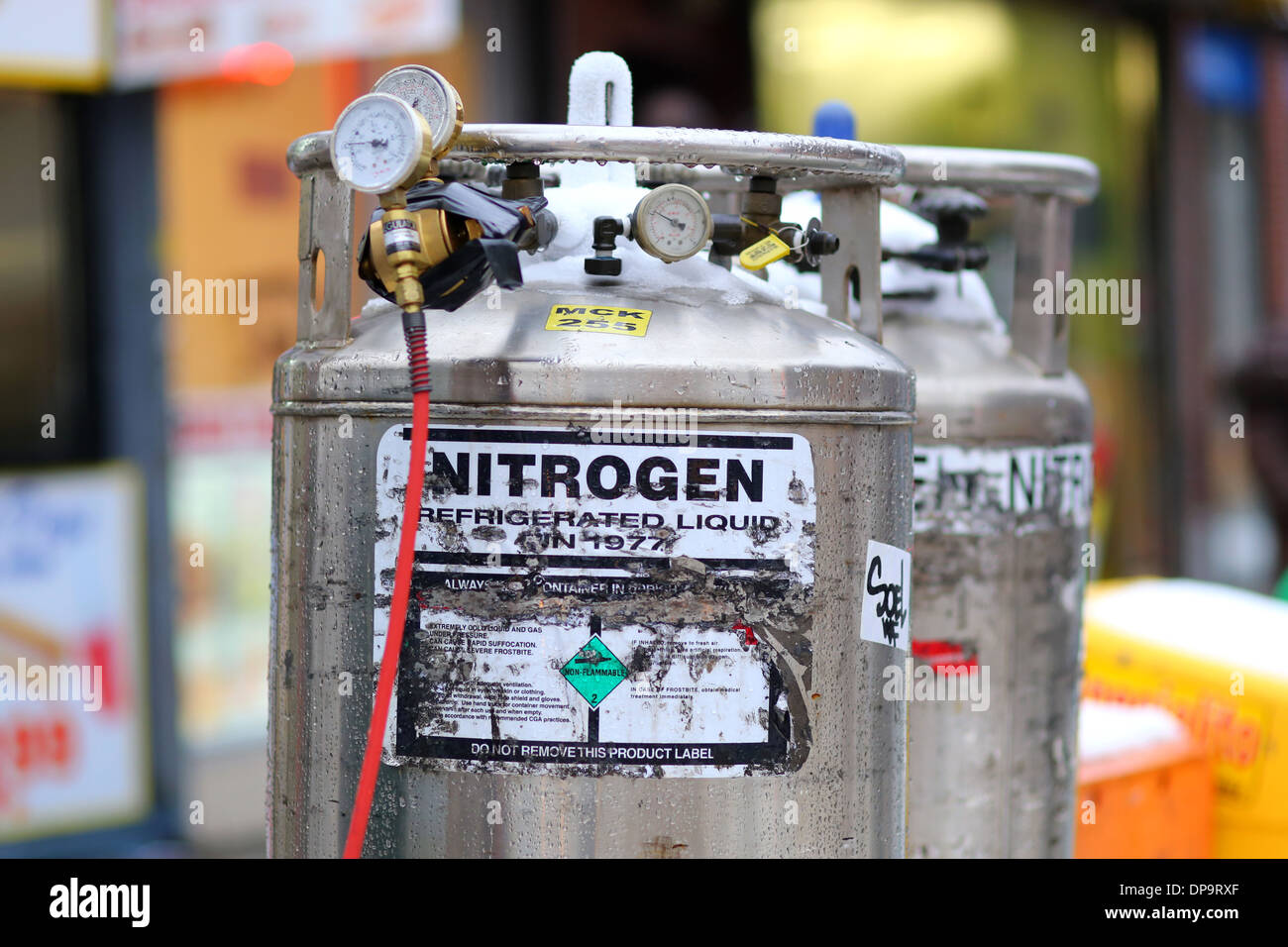 A stainless steel tank of liquid nitrogen with pressure gauges Stock Photo