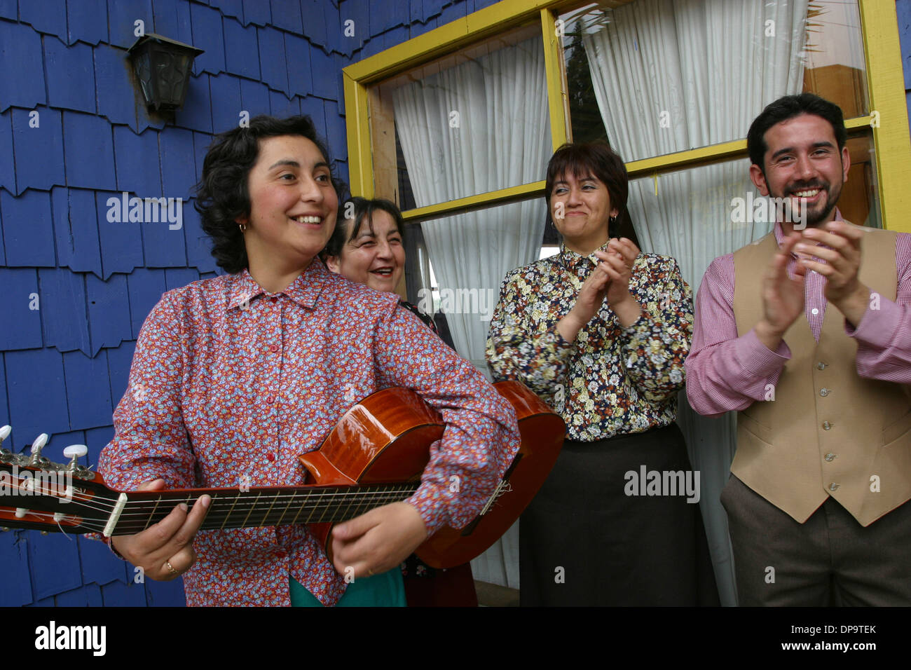 Guitarist and dancers at the Restaurant Octavio, Castro, Chiloe Island, Chile Stock Photo