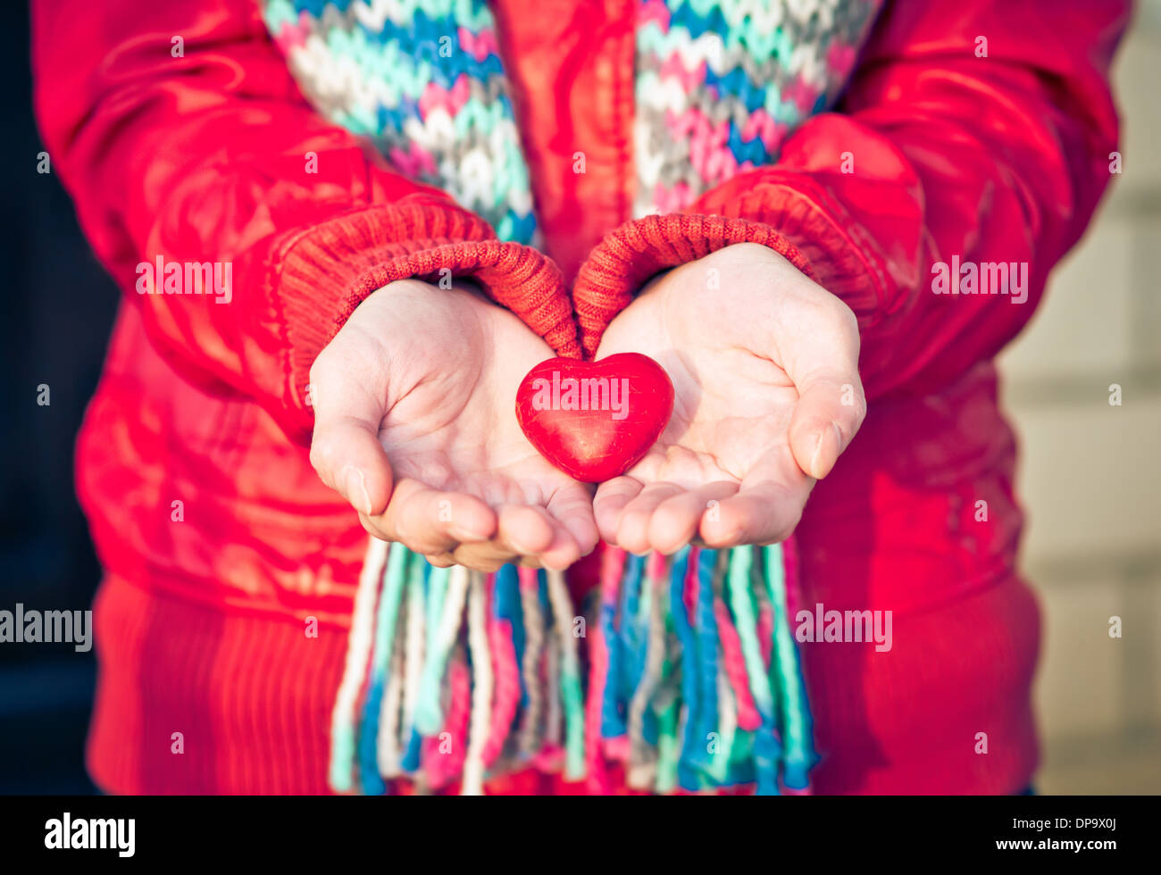 Heart shape love symbol in woman hands Valentines Day romantic greeting people relationship concept winter holiday Stock Photo