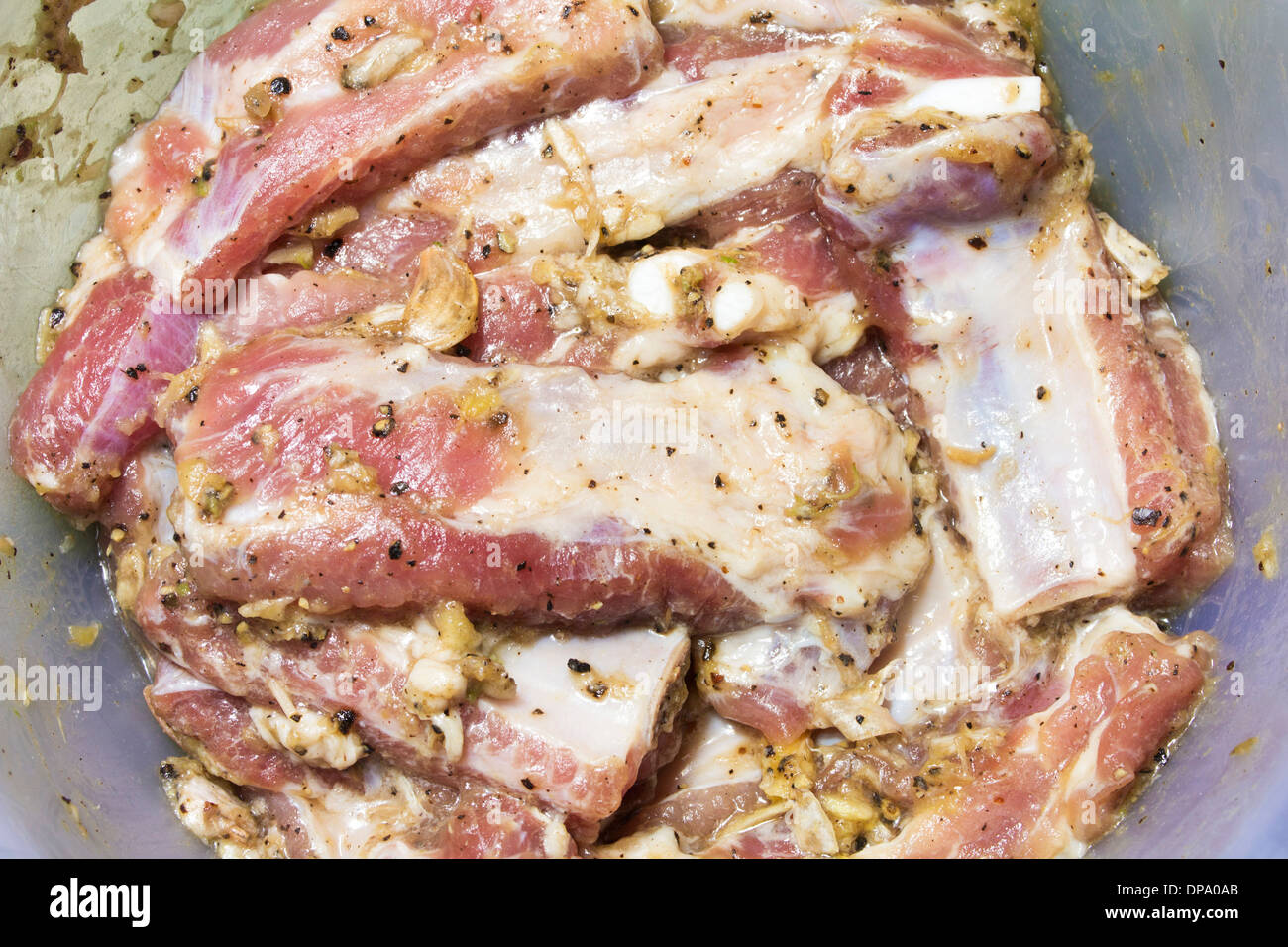 sparerib raw marinate with pepper and garlic uncooked Stock Photo