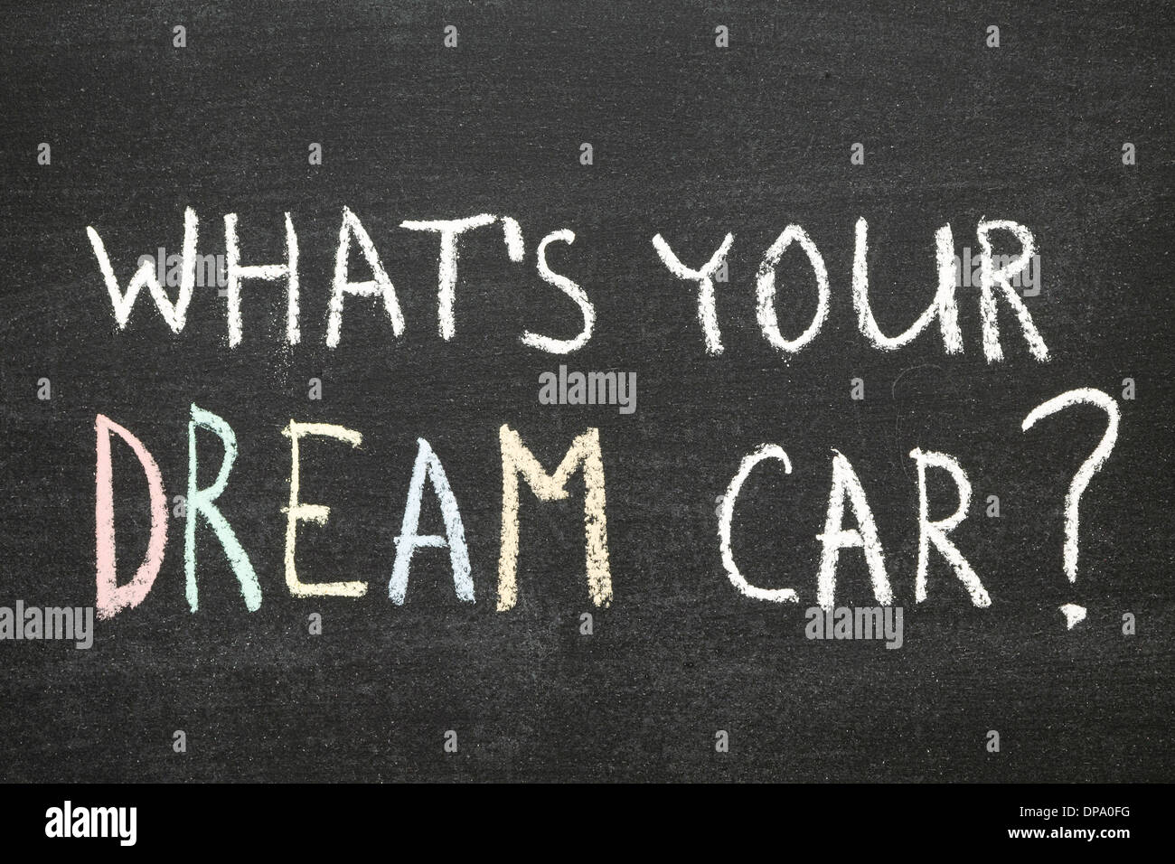 What's your dream car? phrase handwritten on chalkboard by color chalk