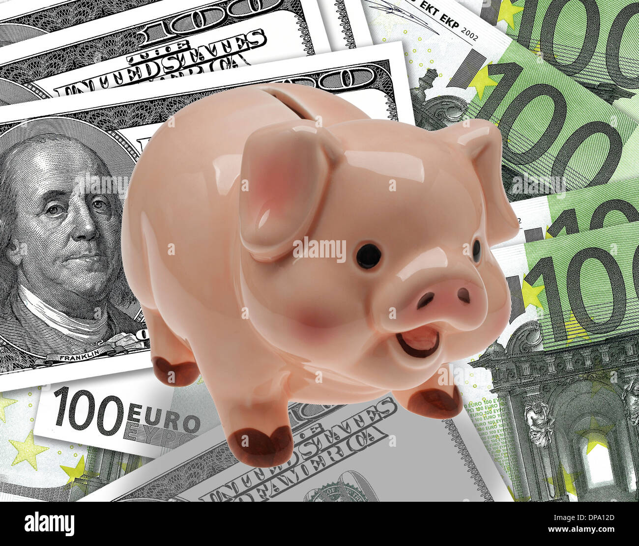 China/ceramic child’s savings or piggy bank on background of euro and dollar currency. Stock Photo