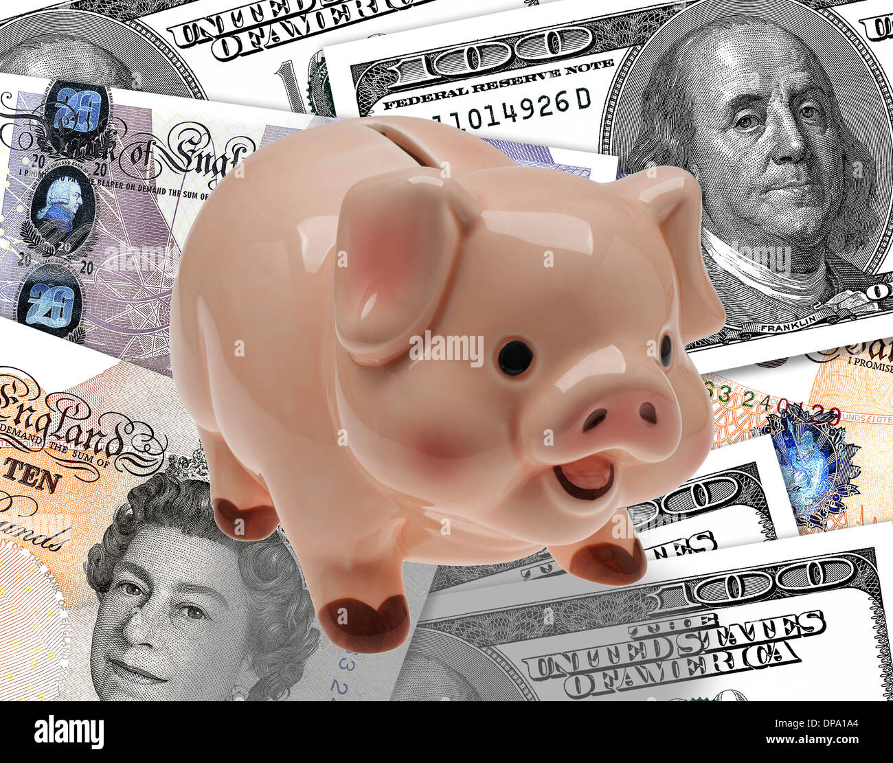 China/ceramic child’s savings or piggy bank on background of pound and dollar currency. Stock Photo