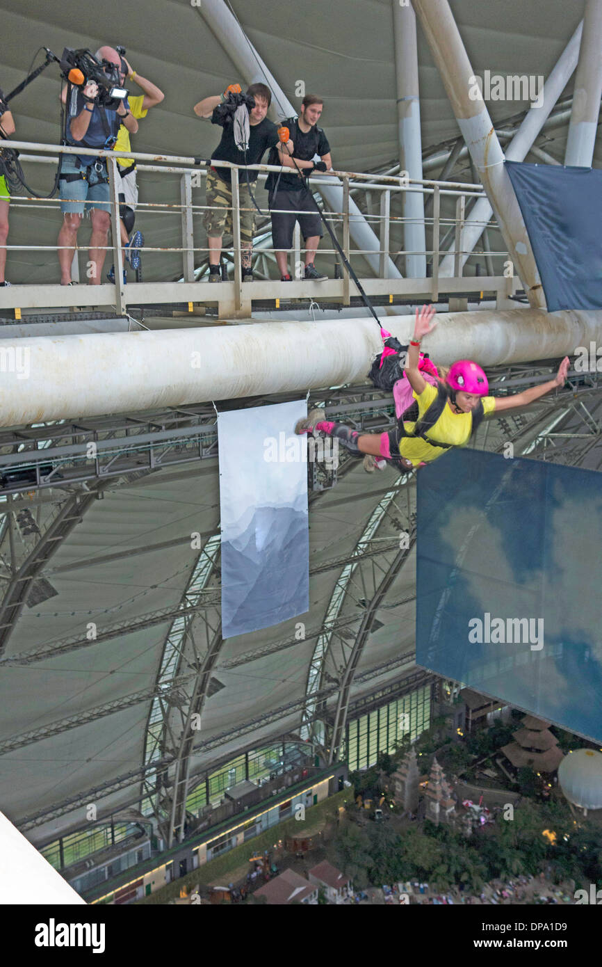 A base jumper jumps from 96 meters platform into the hangar at Tropical