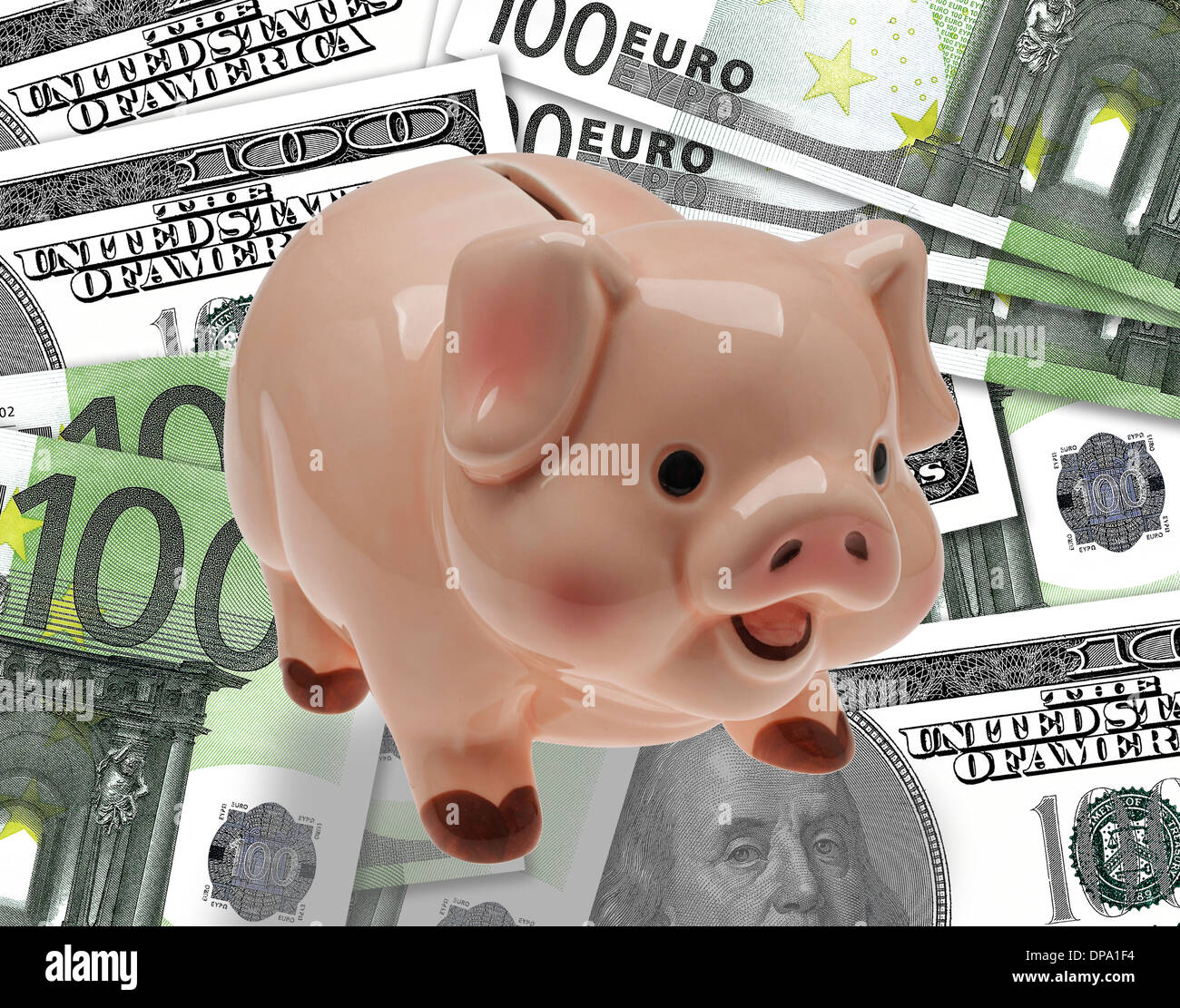 China/ceramic child’s savings or piggy bank on background of euro and dollar currency. Stock Photo