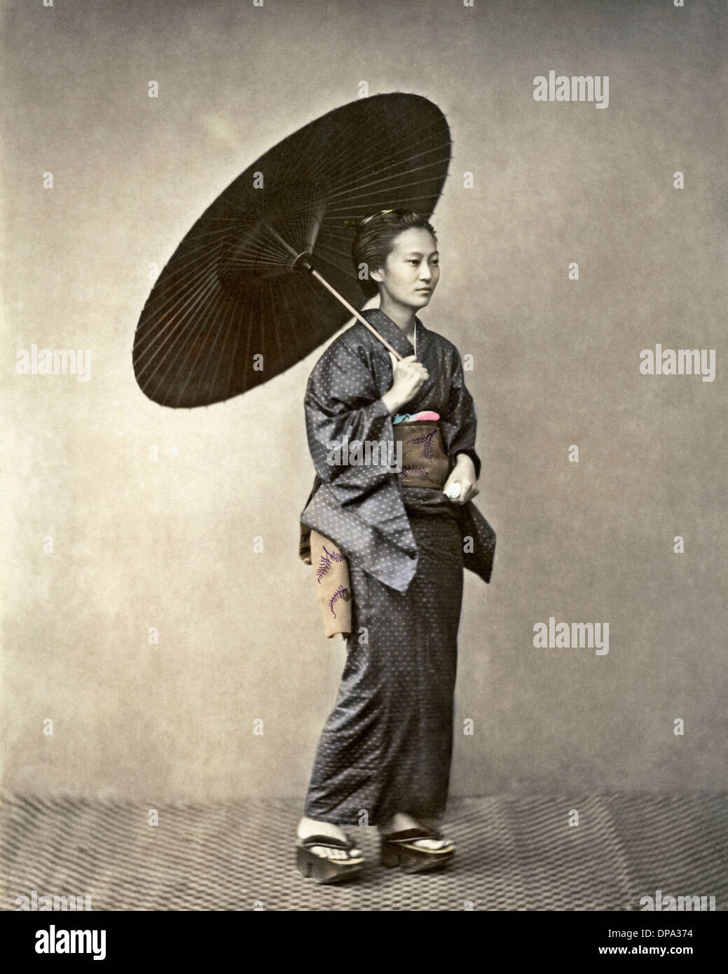 Young woman with parasol, Japan Stock Photo - Alamy