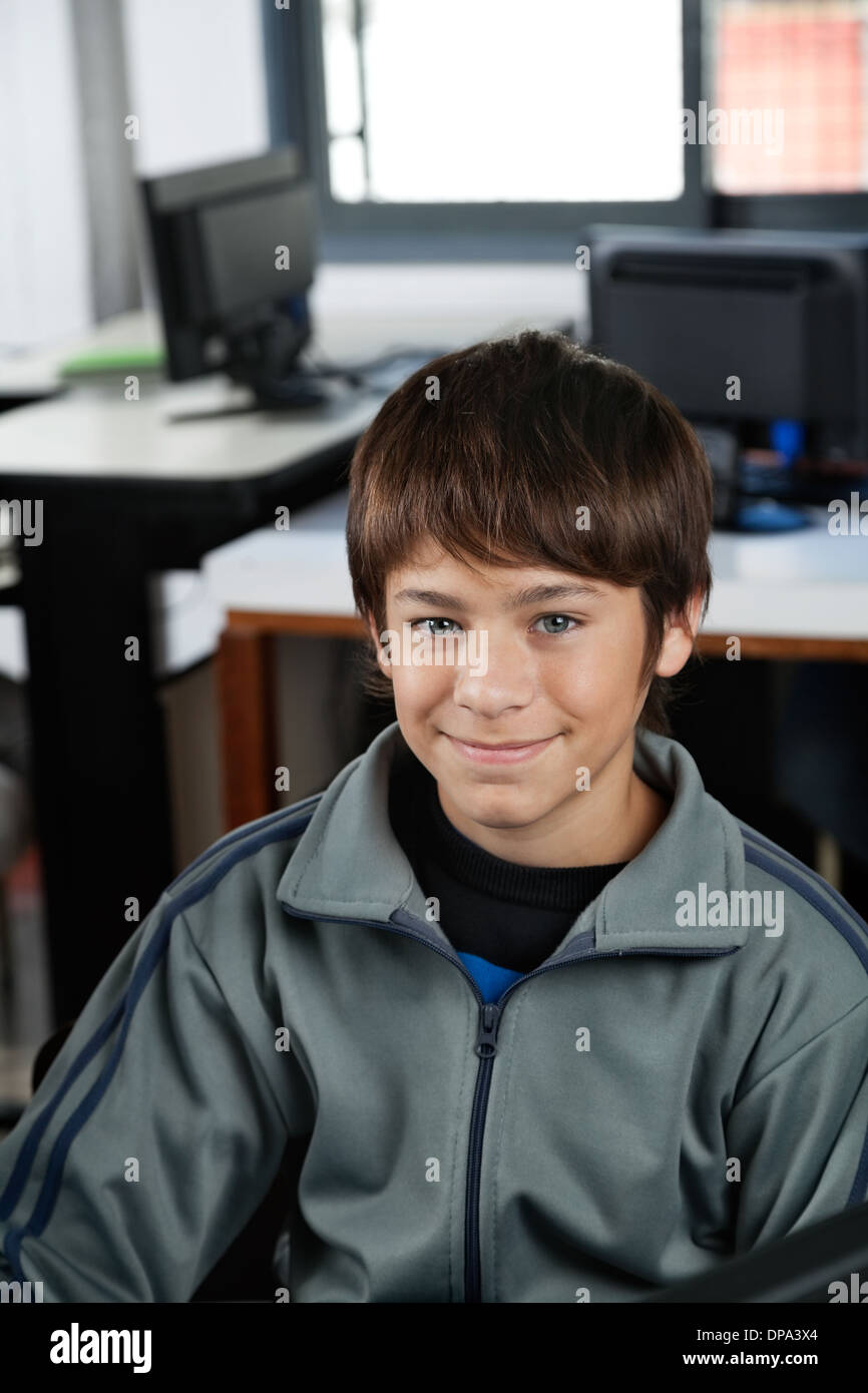 High School Student Smiling In Computer Class Stock Photo Alamy
